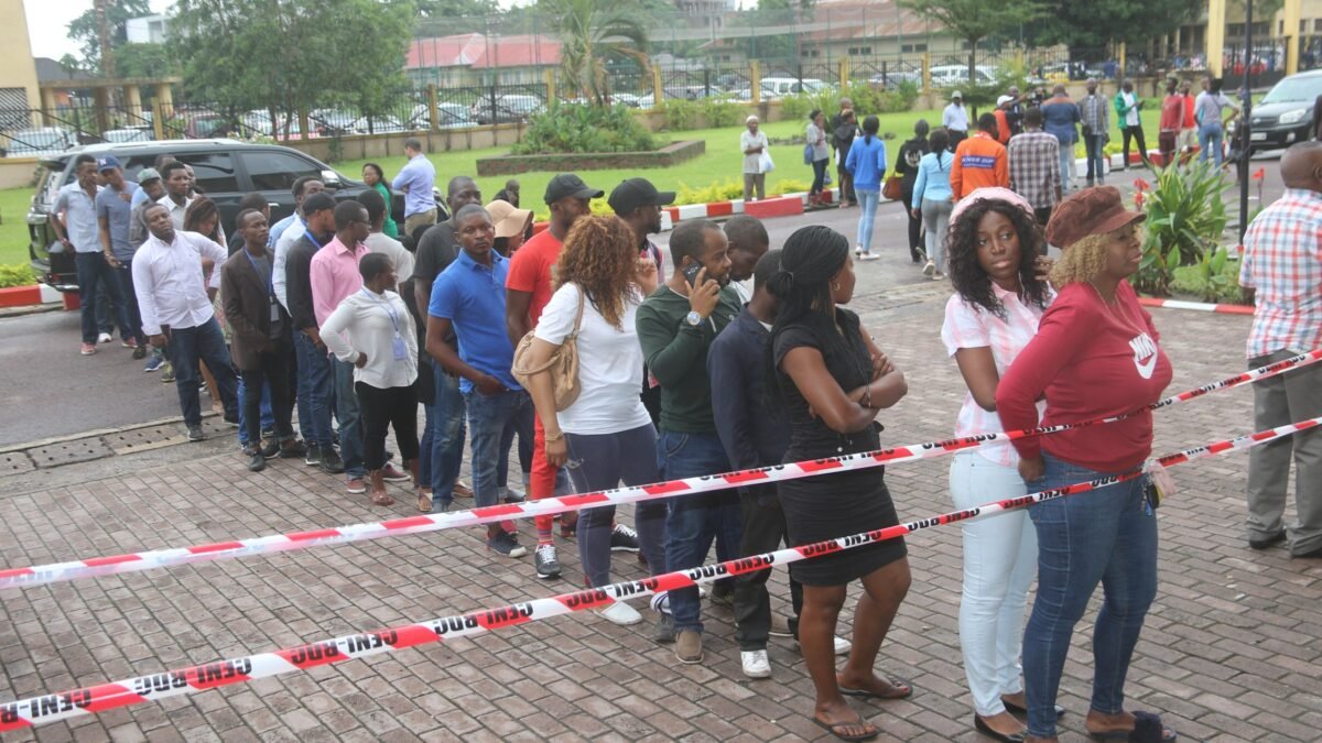 Voters queueing at a polling station in Africa.