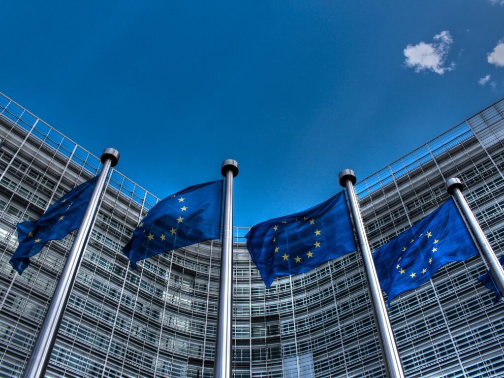 European Union flags outside the Berlaymont building in Brussels.