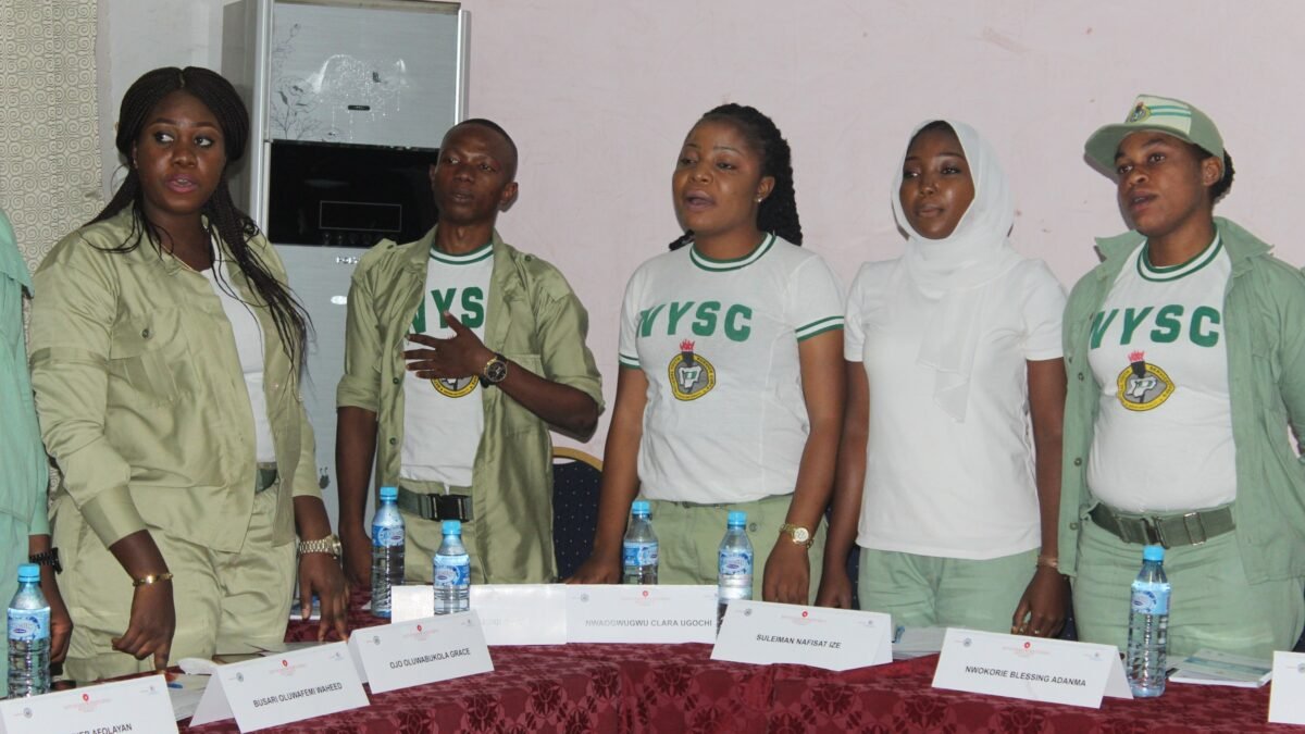 Members of the National Youth Service Corps in uniform at an official event in Nigeria.