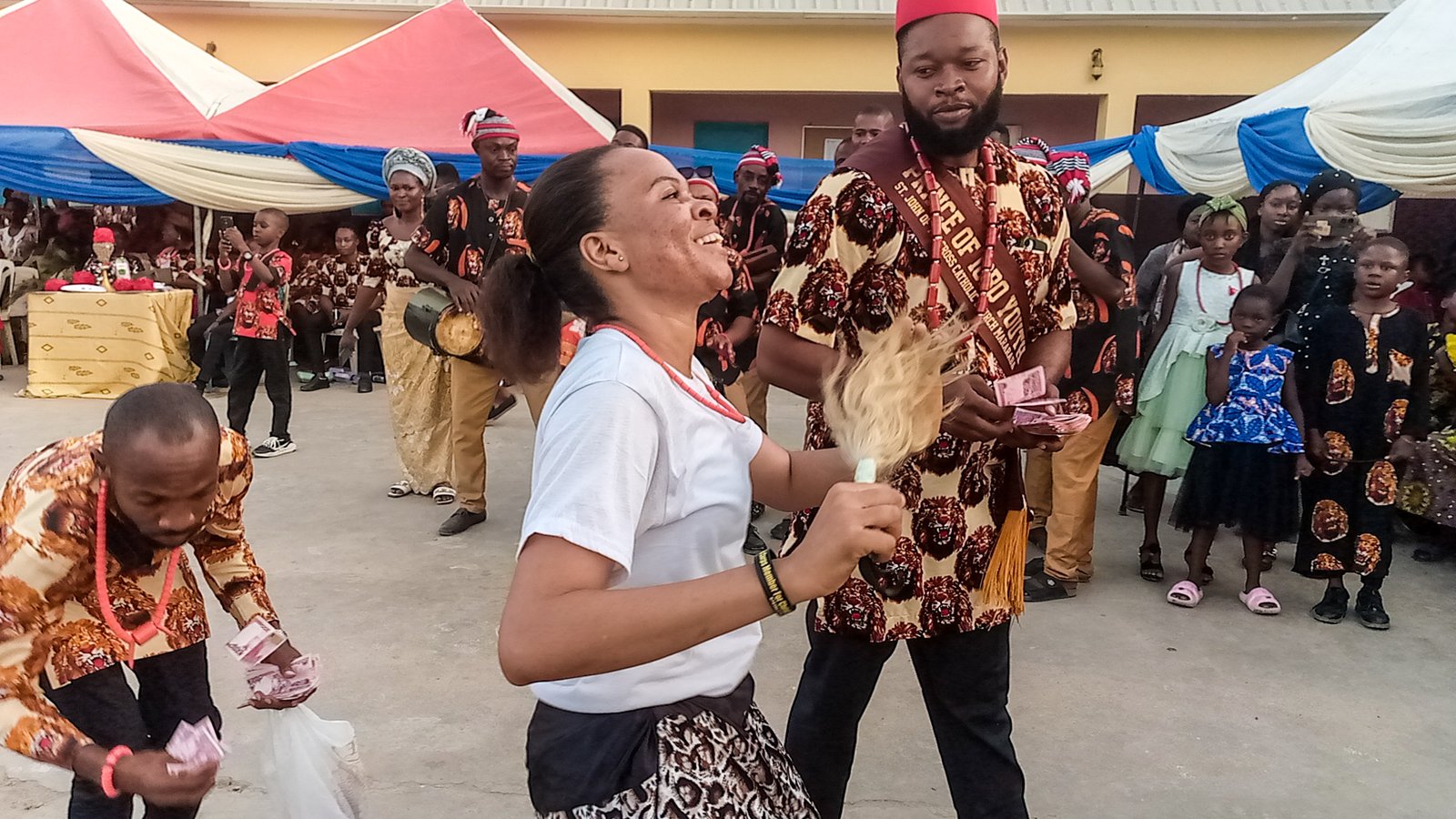Two Igbo elders in a dramatised scene illustrating Achebe's Things Fall Apart.