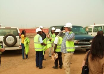 Inspectors and officials at the Newmont mine site, Ghana.