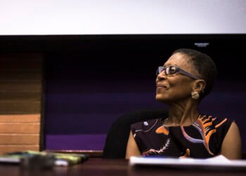 A speaker at an African feminist studies conference session.