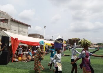 Women carrying goods at Mallam Atta market in Accra, Ghana.