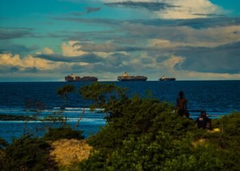 Container ships anchored off the coast at Coco Beach, Dar es Salaam.