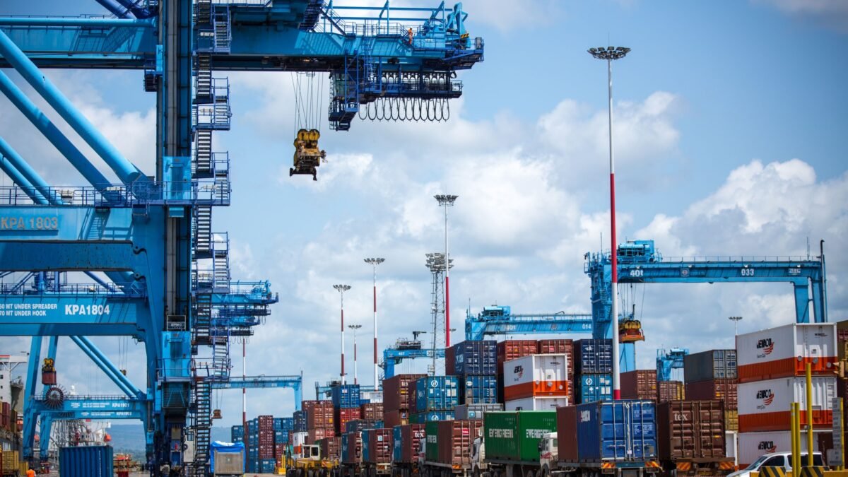 Gantry cranes and stacked containers at the port of Mombasa, Kenya.