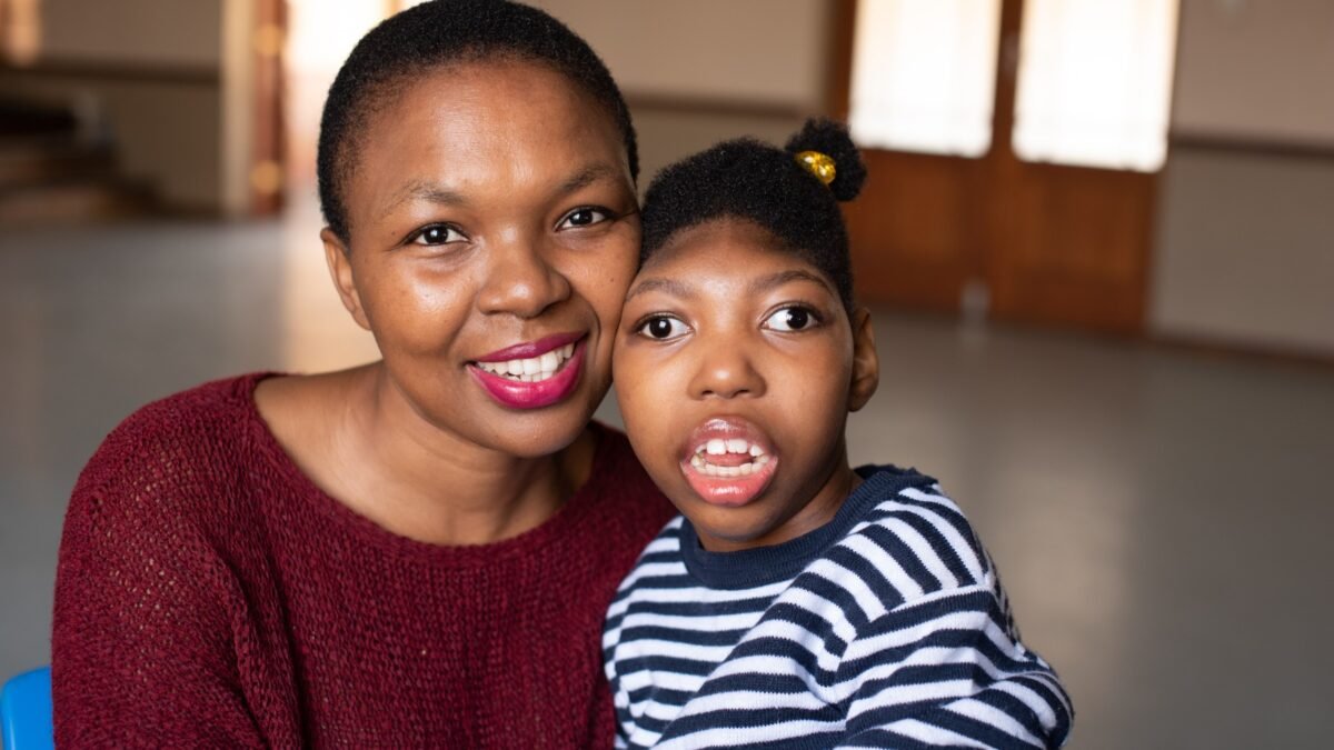 A mother and her daughter, who has a developmental disability, at a support centre in South Africa.