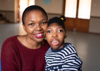 A mother and her daughter, who has a developmental disability, at a support centre in South Africa.
