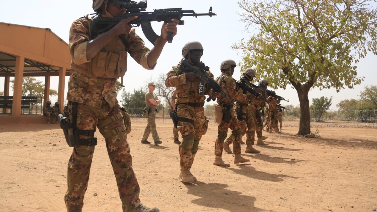 Burkinabe soldiers responding to a simulated ambush during a multinational training exercise.
