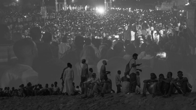 A mass night-time sit-in during the Sudanese uprising.
