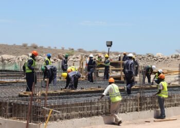 Workers pouring foundations at the Lake Turkana wind power project, Kenya.