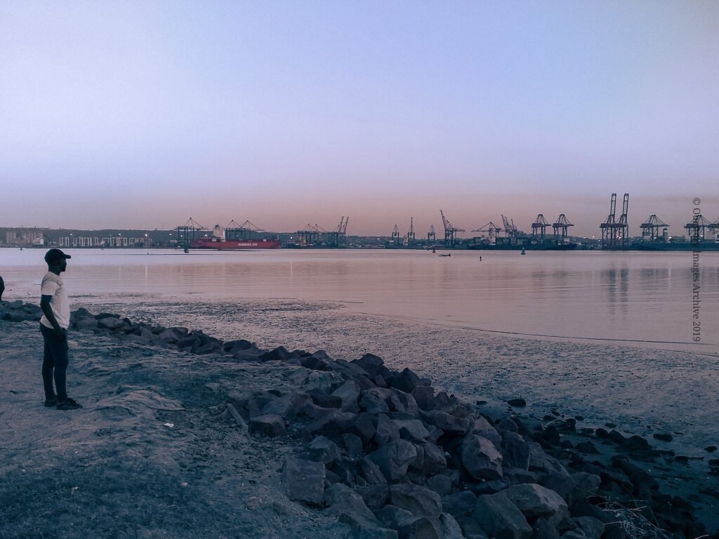 Cranes at Durban harbour, South Africa, at dusk.