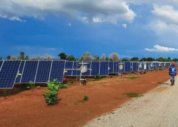 Villagers gathered at a solar-powered clean water installation in rural Africa.