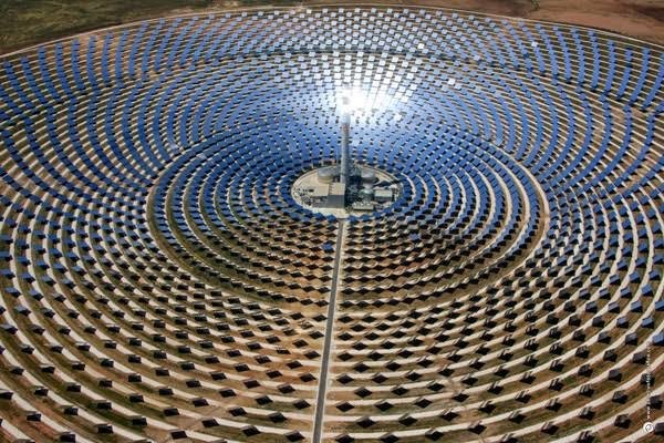 Villagers gathered at a solar-powered clean water installation in rural Africa.