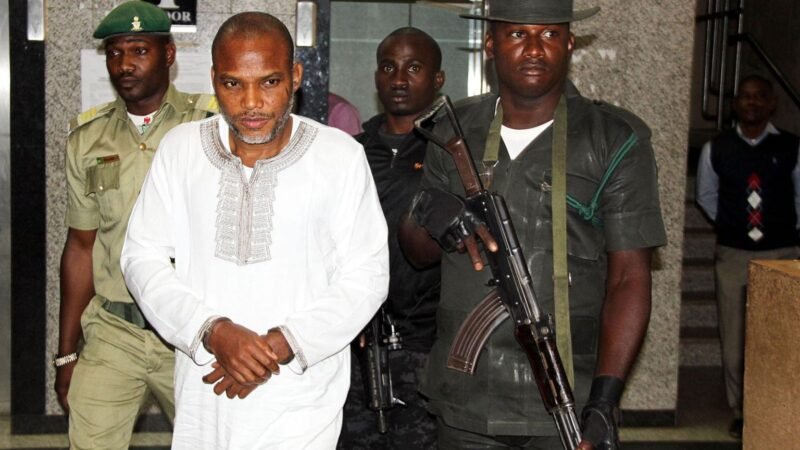 Nnamdi Kanu escorted by heavily armed Nigerian security personnel inside a courthouse