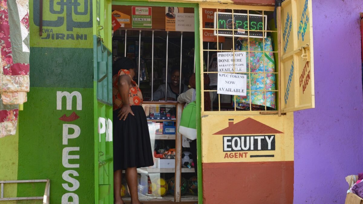 An M-PESA and Equity Bank agent shopfront in Nairobi, Kenya.